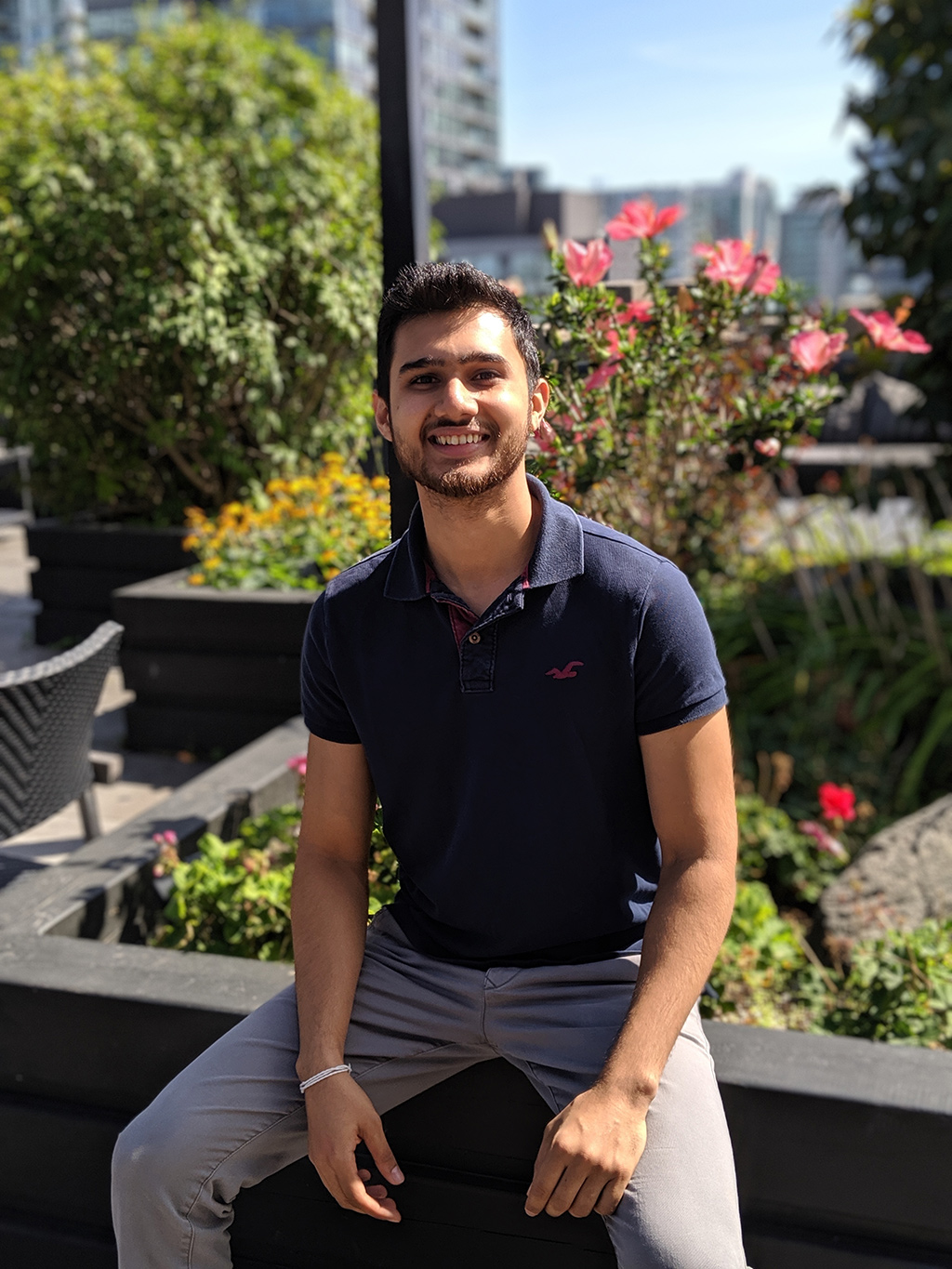 Navaz sitting on the rooftop